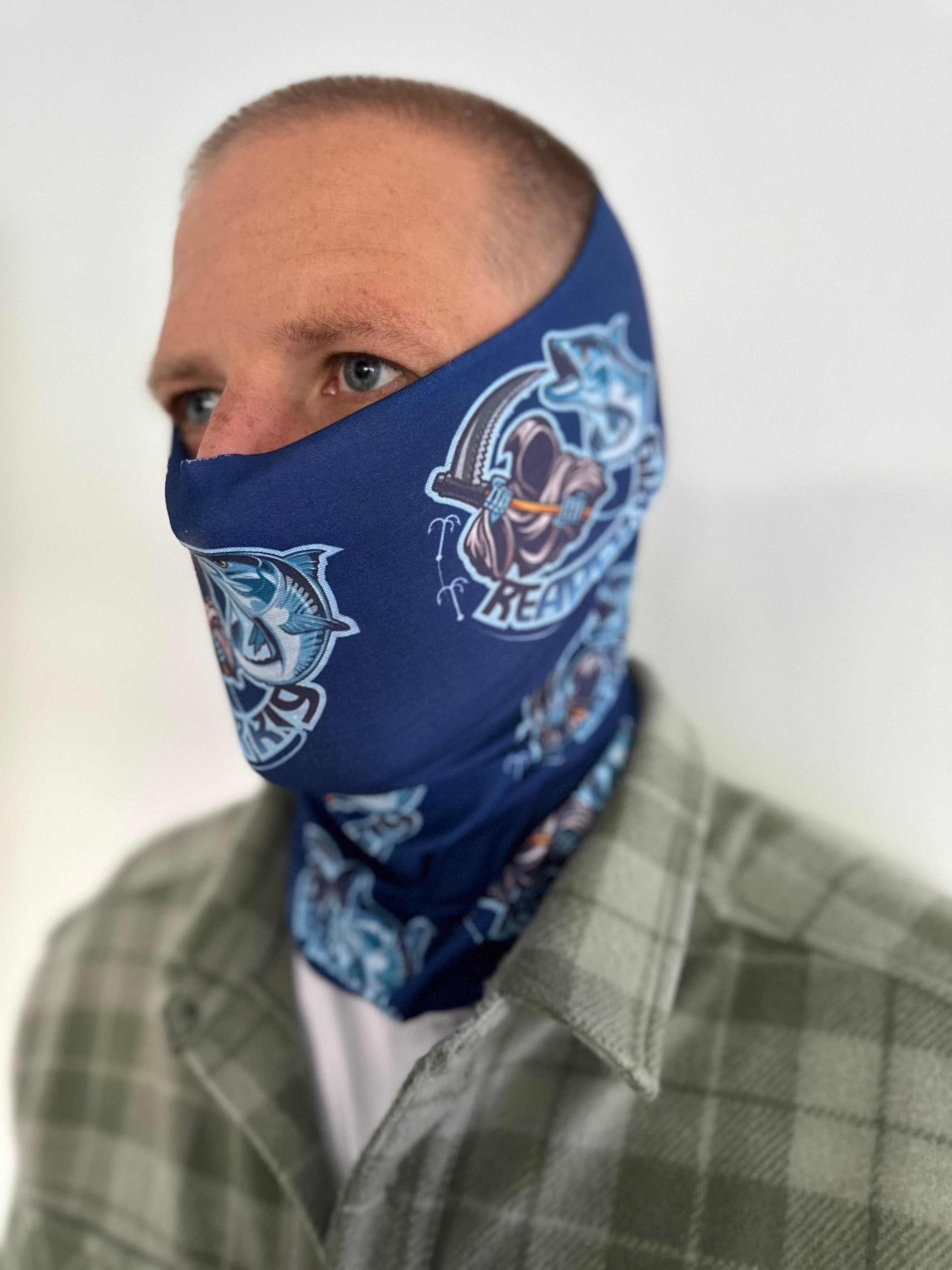 Blue Reaper Rig Neck Gaiter with logo design worn by person.