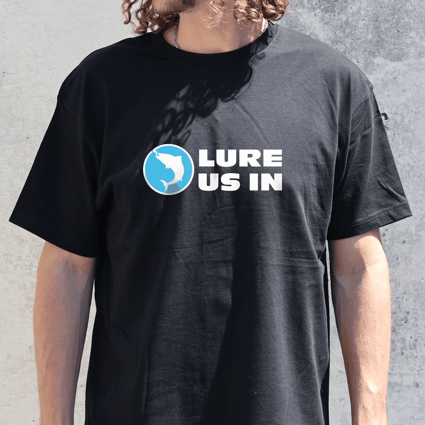 Black Lure Us In Short Sleeve T-Shirt being worn